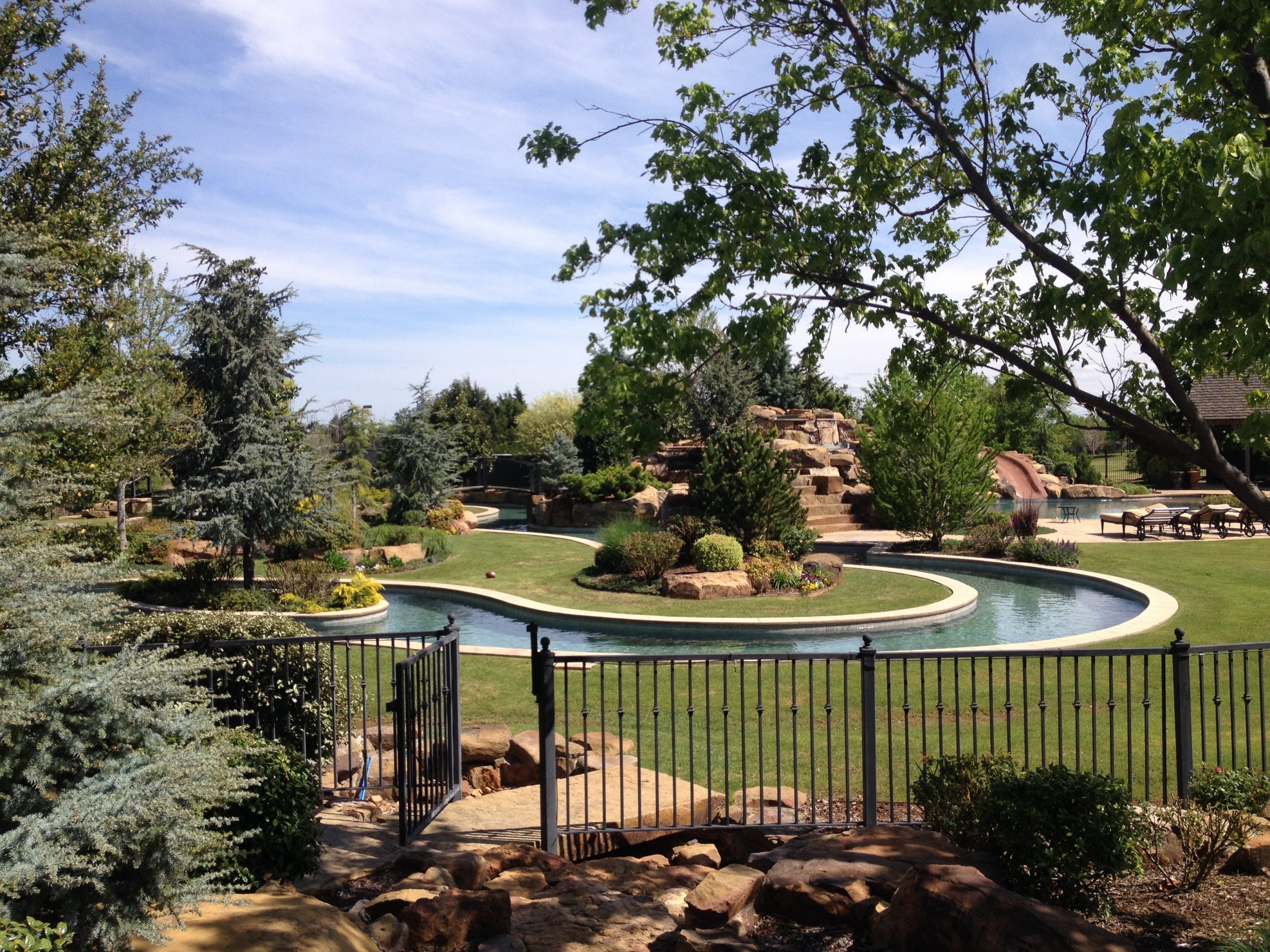 Scapes Inc Landscape shows a photo of a residential lazy river