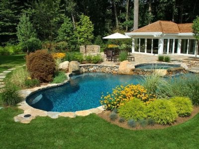 Scapes Inc Landscape Design provides an example of pool landscaping